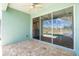 Patio with view of lanai, pool, backyard, and part of kitchen at 2241 Boxwood St, North Port, FL 34289