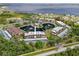 Serene community featuring condos with water views, lush landscaping, two ponds with water features, and community amenities at 23465 Harborview Rd # 915, Punta Gorda, FL 33980
