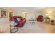Bright living room featuring comfortable furniture, tile flooring, and bright lighting at 23465 Harborview Rd # 915, Punta Gorda, FL 33980