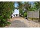 Community pier overlooking the water with informational signage and lush greenery at 23465 Harborview Rd # 915, Punta Gorda, FL 33980
