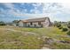 Charming single-story home featuring an attached garage, and minimal landscaping at 2368 Pellam Blvd, Port Charlotte, FL 33948