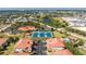 Aerial view showcases proximity to tennis courts, community pool, and major roads near this community at 240 West End Dr # 622, Punta Gorda, FL 33950