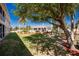 Sprawling green lawn leading to the community pool and pool house at 240 West End Dr # 622, Punta Gorda, FL 33950