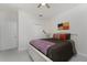 Bedroom featuring a full sized bed, closet, ceiling fan, and art piece at 240 West End Dr # 622, Punta Gorda, FL 33950