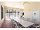 Spacious community room with tables and view of the pool at 240 West End Dr # 622, Punta Gorda, FL 33950