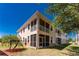 Back exterior of a multi-unit home, featuring screened in patios at 240 West End Dr # 622, Punta Gorda, FL 33950