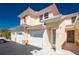 Condominium exterior featuring a private front entrance and attached garages for convenient parking at 240 West End Dr # 622, Punta Gorda, FL 33950