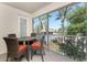 Relaxing lanai with comfortable seating and views of the pool and landscaping at 240 West End Dr # 622, Punta Gorda, FL 33950