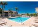 Community pool with lounge chairs and buildings in background at 240 West End Dr # 622, Punta Gorda, FL 33950