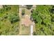 Aerial view of home with lush greenery, showcasing its private setting at 2679 Pascal Ave, North Port, FL 34286