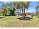 Charming single-Gathering home featuring a spacious backyard, perfect for outdoor living and entertaining under the Florida sun at 2679 Pascal Ave, North Port, FL 34286
