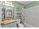 Well-lit bathroom with a vanity, toilet, and shower-tub combination, providing a functional and clean space at 2679 Pascal Ave, North Port, FL 34286