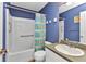 Cozy bathroom with tub, shower, commode, and vanity at 2679 Pascal Ave, North Port, FL 34286