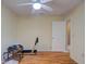 This bedroom is carpet-free and has a treadmill ready to be used at 2699 Suncoast Lakes Blvd, Punta Gorda, FL 33980