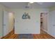 This bedroom features beautiful wood floors, two closets and neutral paint at 2699 Suncoast Lakes Blvd, Punta Gorda, FL 33980