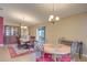 Inviting dining room with stylish furniture and plenty of natural light at 2699 Suncoast Lakes Blvd, Punta Gorda, FL 33980