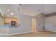 Modern kitchen with granite countertops, stainless steel appliances, and ample cabinet space at 2699 Suncoast Lakes Blvd, Punta Gorda, FL 33980