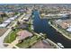 Waterfront home boasts lush landscaping, a private dock, and serene canal views, perfect for boating enthusiasts at 2850 Magdalina Dr, Punta Gorda, FL 33950
