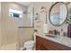 Elegant bathroom featuring a modern sink and walk-in shower at 2850 Magdalina Dr, Punta Gorda, FL 33950