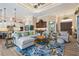 Bright and airy living room featuring high ceilings, pendant lights, and an open floor plan at 2850 Magdalina Dr, Punta Gorda, FL 33950