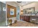Luxurious bathroom showcasing granite counters, walk-in shower, and stylish decor at 2850 Magdalina Dr, Punta Gorda, FL 33950