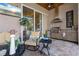 Outdoor kitchen and seating area, perfect for entertaining with a grill and a view of the yard at 2850 Magdalina Dr, Punta Gorda, FL 33950