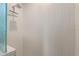 Modern shower with a rain shower head and textured tile wall at 2850 Magdalina Dr, Punta Gorda, FL 33950