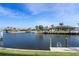 Scenic waterfront view showcasing luxurious homes and private boat docks at 2850 Magdalina Dr, Punta Gorda, FL 33950