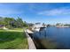 Picturesque canal view with a boat lift and well-maintained landscaping at 2850 Magdalina Dr, Punta Gorda, FL 33950
