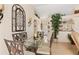 Elegant dining room with a glass table, stylish chairs, and decorative accents at 3078 Mancini Ter, Punta Gorda, FL 33983