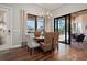 Cozy dining area with natural light and access to the outdoor patio, ideal for Gathering meals at 347 Portofino Dr, Punta Gorda, FL 33950