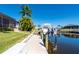 Dock offers a boat lift, and easy water access at 347 Portofino Dr, Punta Gorda, FL 33950