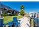 Dock features a boat lift and seating area, perfect for waterfront enjoyment at 347 Portofino Dr, Punta Gorda, FL 33950