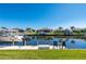 Backyard canal view with dock and boats, perfect for waterfront living at 347 Portofino Dr, Punta Gorda, FL 33950