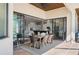 Covered lanai offers indoor-outdoor living with views of the home's interior at 347 Portofino Dr, Punta Gorda, FL 33950