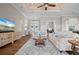 Bright living room with elegant furnishings, modern lighting, and seamless flow to other spaces at 347 Portofino Dr, Punta Gorda, FL 33950