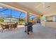 Covered and screened patio with a grill perfect for enjoying Florida outdoors at 3614 January Ave, North Port, FL 34288