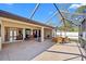 A screened patio, great for outdoor dining and relaxation with a stone floor at 3614 January Ave, North Port, FL 34288