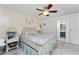 Charming bedroom with coastal decor and comfortable bedding evokes a relaxing vibe at 4022 Beaver Ln # 500C, Port Charlotte, FL 33952