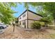 Well-maintained condo building surrounded by mature trees and landscaped gardens at 4022 Beaver Ln # 500C, Port Charlotte, FL 33952