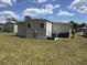 Well-maintained exterior with simple landscaping at 5048 Palena Blvd, North Port, FL 34287