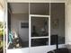 Relaxing screened-in lanai with comfortable seating area, perfect for outdoor enjoyment at 5048 Palena Blvd, North Port, FL 34287