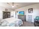 Comfortable main bedroom with light gray walls, soft carpeting, and plenty of dresser storage at 5309 Shell Mound Cir, Punta Gorda, FL 33982