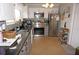 Updated kitchen with stainless steel appliances, modern cabinets, and ample counter space at 6249 Drucker Cir, Port Charlotte, FL 33981