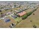A bird's eye view showcasing the property's location within a serene neighborhood with nearby amenities at 7196 N Plum Tree # 323, Punta Gorda, FL 33955