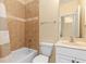 Well-maintained bathroom with a tiled shower, vanity, and updated fixtures at 7196 N Plum Tree # 323, Punta Gorda, FL 33955