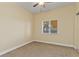 Cozy bedroom featuring neutral carpeting, a window, and closet space at 7196 N Plum Tree # 323, Punta Gorda, FL 33955