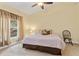 Comfortable bedroom with ample natural light, neutral tones, and cozy decor at 7196 N Plum Tree # 323, Punta Gorda, FL 33955