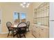 Cozy dining area with stylish furnishings, natural light, and a welcoming atmosphere at 7196 N Plum Tree # 323, Punta Gorda, FL 33955