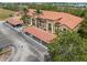 Beautiful condo building with covered parking, manicured gardens, and a welcoming entrance at 7196 N Plum Tree # 323, Punta Gorda, FL 33955